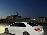 Toyota Camry 2014 года за 6 900 000 тг. в Атырау