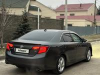 Toyota Camry 2014 года за 8 500 000 тг. в Актобе