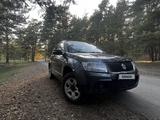 Suzuki Grand Vitara 2011 годаүшін3 300 000 тг. в Караганда