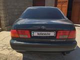 Toyota Carina E 1997 года за 2 100 000 тг. в Туркестан – фото 4