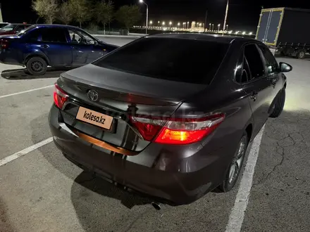 Toyota Camry 2015 года за 5 400 000 тг. в Жанаозен – фото 8