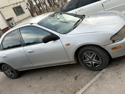 Mazda Familia 1998 года за 900 000 тг. в Алматы – фото 2
