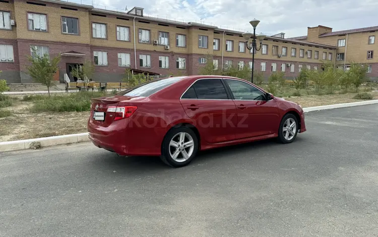 Toyota Camry 2013 годаfor8 800 000 тг. в Актобе