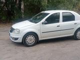 Renault Logan 2012 года за 2 500 000 тг. в Караганда – фото 3