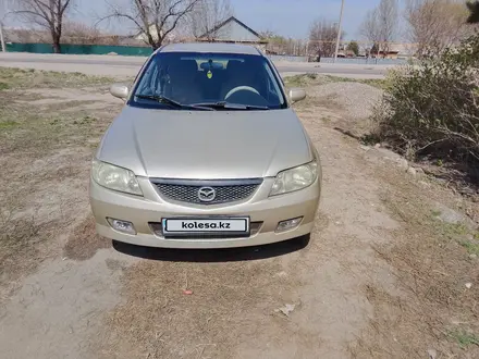 Mazda 323 2002 года за 2 350 000 тг. в Алматы – фото 2