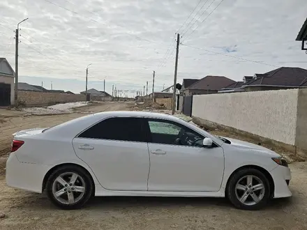 Toyota Camry 2014 года за 6 700 000 тг. в Актау – фото 15