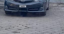 Toyota Camry 2014 года за 6 500 000 тг. в Караганда