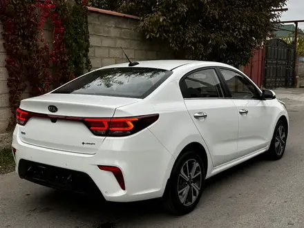 Kia Rio 2018 года за 7 800 000 тг. в Шымкент – фото 4