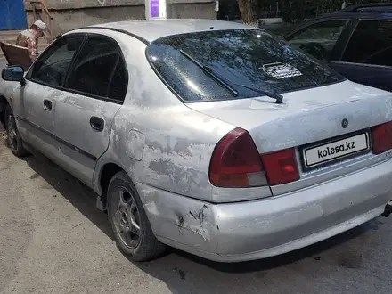 Mitsubishi Carisma 1998 года за 800 000 тг. в Караганда – фото 3