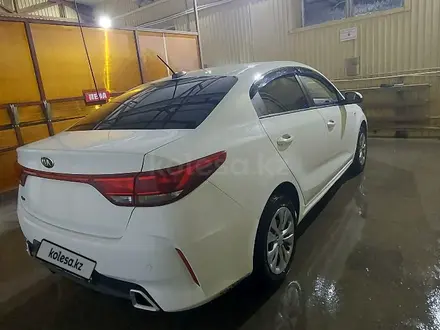 Kia Rio 2021 года за 8 200 000 тг. в Актобе – фото 4