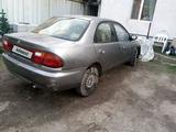 Mazda 323 1995 года за 500 000 тг. в Алматы – фото 2