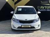 Kia Rio 2015 года за 6 190 000 тг. в Атырау – фото 2