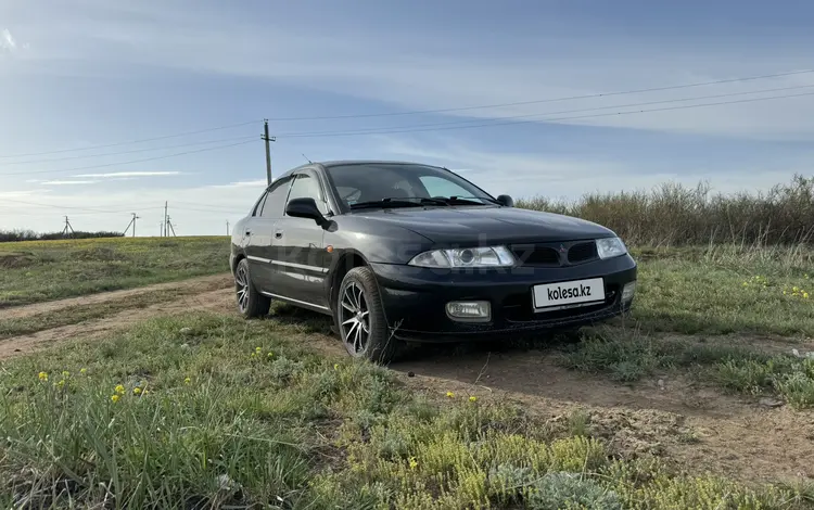 Mitsubishi Carisma 1998 годаүшін2 300 000 тг. в Караганда