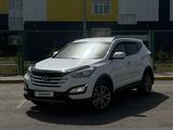 Hyundai Santa Fe 2014 года за 8 799 999 тг. в Караганда