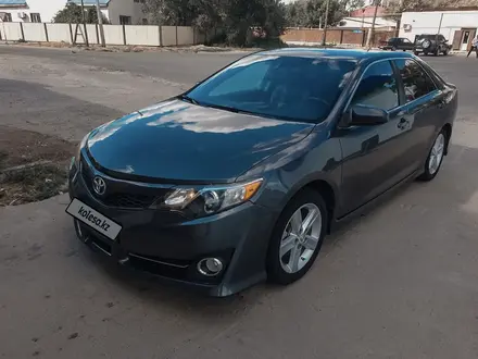 Toyota Camry 2013 года за 7 200 000 тг. в Атырау