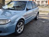 Mazda 323 2002 года за 1 600 000 тг. в Шымкент – фото 2