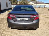 Toyota Camry 2014 годаfor8 500 000 тг. в Атырау – фото 2