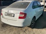 Skoda Rapid 2015 года за 3 550 000 тг. в Актобе – фото 3