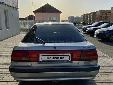 Mazda 626 1991 года за 500 000 тг. в Астана – фото 3