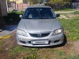 Mazda 323 2002 года за 850 000 тг. в Алматы – фото 2
