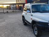 SsangYong Korando 2001 года за 2 100 000 тг. в Жезказган – фото 4