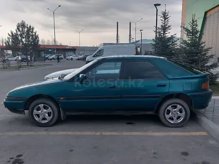 Mazda 323 1994 года за 1 200 000 тг. в Алматы – фото 5