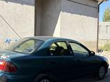 Mazda 323 2000 года за 530 000 тг. в Туркестан – фото 2