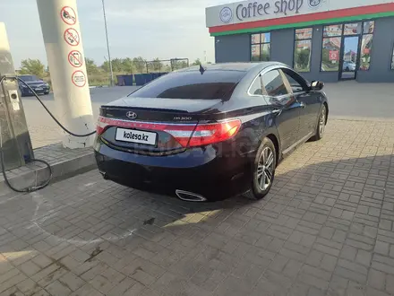 Hyundai Grandeur 2014 года за 9 200 000 тг. в Актобе – фото 2