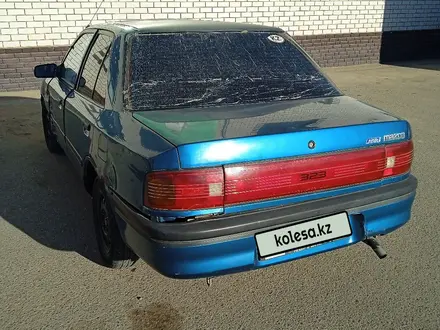 Mazda 323 1994 года за 550 000 тг. в Актобе – фото 15