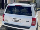 Jeep Patriot 2013 года за 4 800 000 тг. в Атырау – фото 2