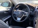 Toyota Camry 2014 года за 6 900 000 тг. в Актау – фото 4