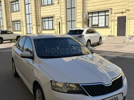 Skoda Rapid 2014 года за 3 900 000 тг. в Жанаозен