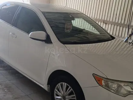 Toyota Camry 2014 года за 5 300 000 тг. в Жанаозен