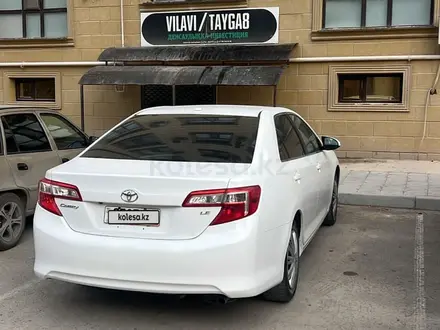 Toyota Camry 2014 года за 5 300 000 тг. в Жанаозен – фото 5