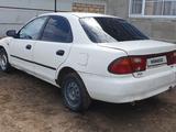 Mazda 323 1995 года за 880 000 тг. в Актобе – фото 3