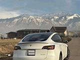 Tesla Model Y 2023 года за 19 000 000 тг. в Астана – фото 2