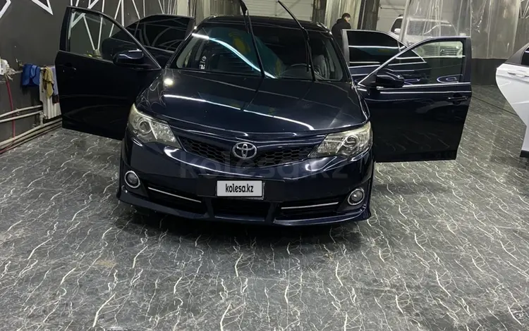 Toyota Camry 2013 годаfor5 500 000 тг. в Жанаозен