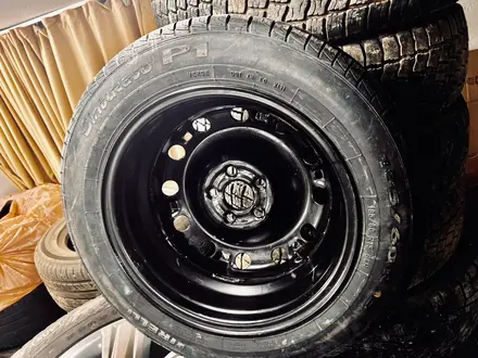 Диск VW Polo с шиной Pirelli 185/60/15 (запаска) за 49 990 тг. в Астана – фото 9
