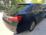 Toyota Camry 2014 годаүшін11 500 000 тг. в Жезказган – фото 5