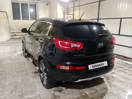 Kia Sportage 2012 года за 7 500 000 тг. в Актобе – фото 4