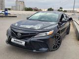 Toyota Camry 2018 года за 12 000 000 тг. в Жанаозен