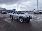 Nissan NP300 2009 года за 3 000 000 тг. в Караганда