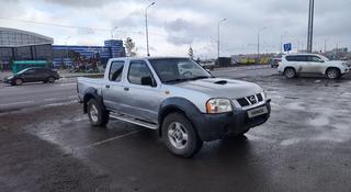 Nissan NP300 2009 года за 3 000 000 тг. в Караганда