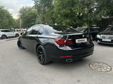 BMW 750 2014 года за 12 800 000 тг. в Алматы – фото 4