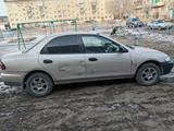 Mazda Familia 1997 года за 1 200 000 тг. в Усть-Каменогорск – фото 2