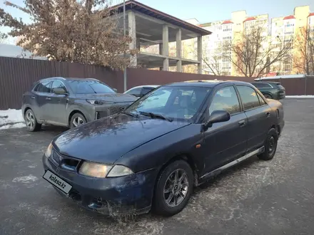 Mitsubishi Carisma 1997 года за 650 000 тг. в Алматы – фото 2