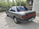 Mazda 323 1993 года за 1 150 000 тг. в Шымкент – фото 2