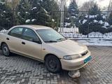 Mazda 323 1997 года за 1 500 000 тг. в Алматы – фото 4