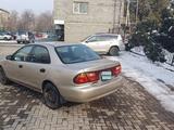Mazda 323 1997 года за 1 500 000 тг. в Алматы – фото 5