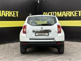 Renault Duster 2014 года за 4 650 000 тг. в Актобе – фото 5